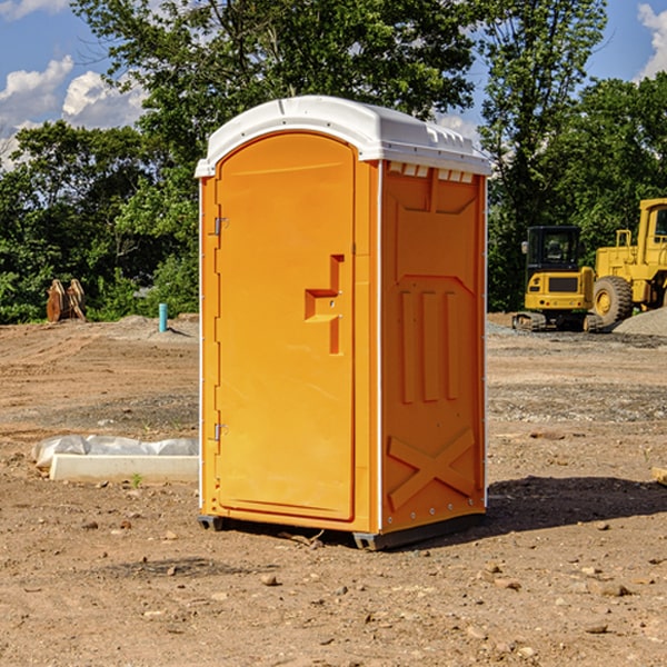 how often are the portable restrooms cleaned and serviced during a rental period in Denmark Iowa